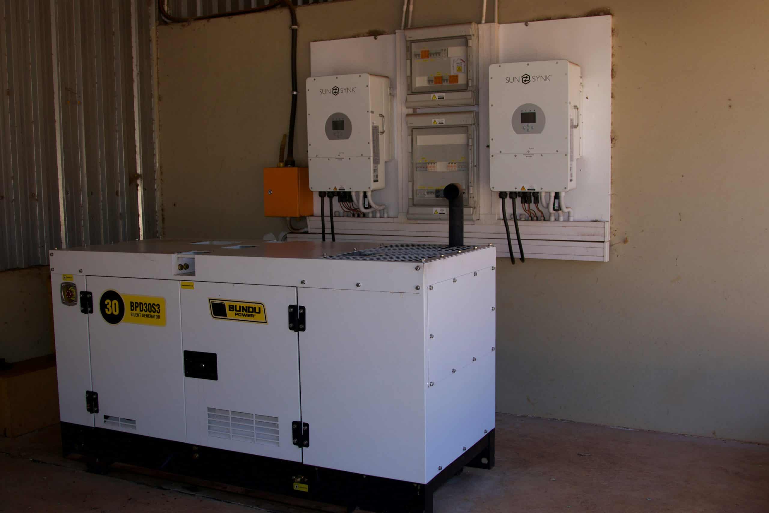 Backup generator and solar inverters installed indoors